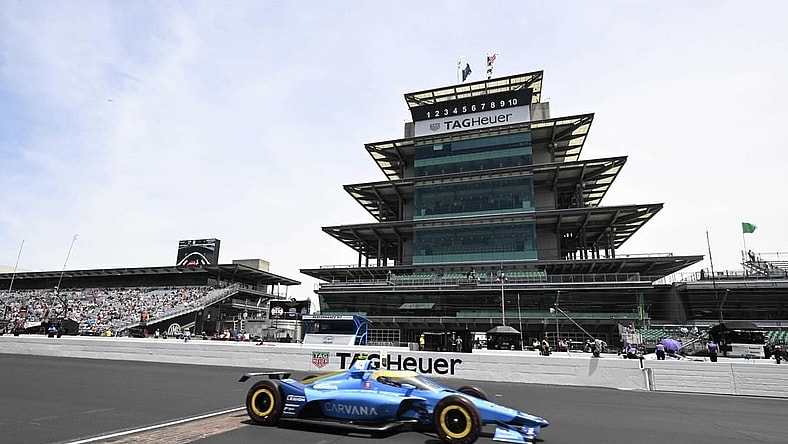 May 23, 2022; Indianapolis, Indiana, Chip Ganassi Racing driver Jimmie Johnson (48) crosses the line of bricks during practice after qualifying for the 106th Indianapolis 500 at the Indianapolis Motor Speedway. Mandatory Credit: Marc Lebryk-USA TODAY Sports