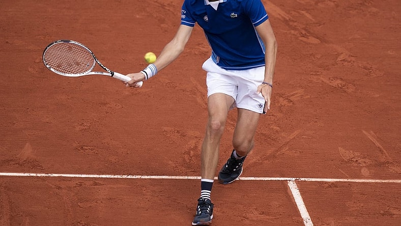 May 24, 2022; Paris, France; Daniil Medvedev returns a shot from Fecund Bagnis (ARG) during their match on day three of the French Open at Stade Roland-Garros.Mandatory Credit: Susan Mullane-USA TODAY Sports
