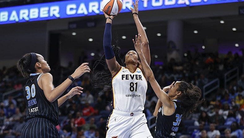 May 24, 2022; Chicago, Illinois, USA; Indiana Fever center Alaina Coates (81) shoots against the Chicago Sky during the second half at Wintrust Arena. Mandatory Credit: Kamil Krzaczynski-USA TODAY Sports