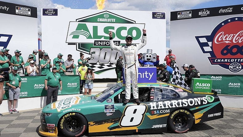 May 28, 2022; Concord, North Carolina, USA;  NASCAR Xfinity Series driver Josh Berry (8) celebrates his win during the Alsco Uniforms 300 at Charlotte Motor Speedway. Mandatory Credit: Jim Dedmon-USA TODAY Sports