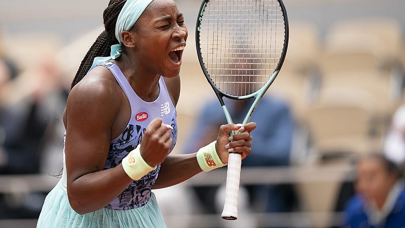 May 29, 2022; Paris, France; Coco Gauff (USA) celebrates winning her match against Elise Mertens (BEL) during their match on day eight of the French Open at Stade Roland-Garros. Mandatory Credit: Susan Mullane-USA TODAY Sports