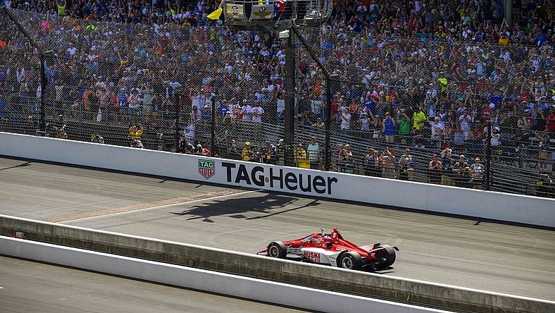 May 29, 2022; Indianapolis, Indiana, USA; Chip Ganassi Racing driver Marcus Ericsson (8) of Sweden crosses the finish line and wins the106th running of the Indianapolis 500 at Indianapolis Motor Speedway. Mandatory Credit: Jerome Miron-USA TODAY Sports