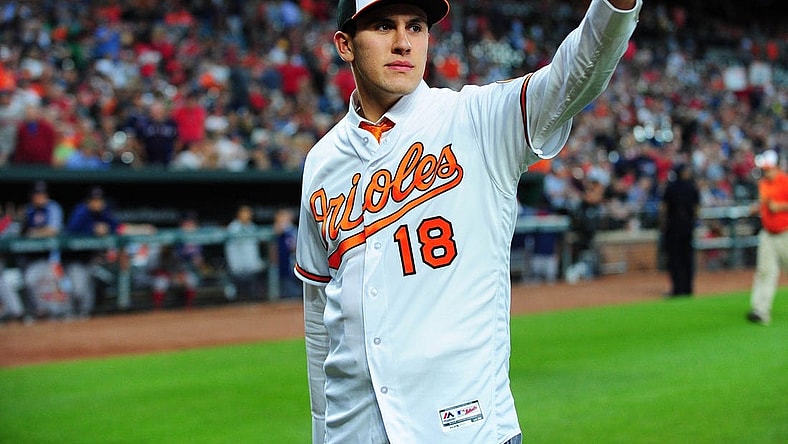 Jun 12, 2018; Baltimore, MD, USA; Baltimore Orioles first round draft pick Grayson Rodriguez (18) waves to the crowd after being introduced during the game against the Boston Red Sox at Oriole Park at Camden Yards. Mandatory Credit: Evan Habeeb-USA TODAY Sports