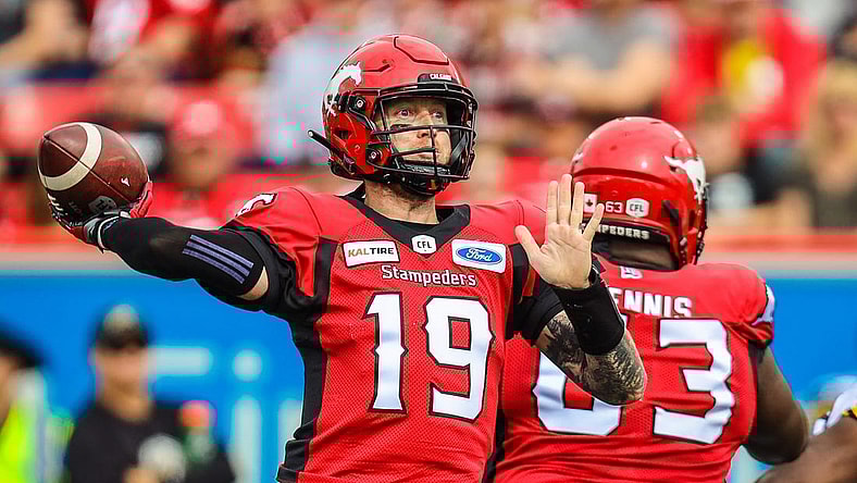 Sep 14, 2019; Calgary, Alberta, CAN; Calgary Stampeders quarterback Bo Levi Mitchell (19) throws a pass against the Hamilton Tiger-Cats in the first half during a Canadian Football League game at McMahon Stadium. Mandatory Credit: Sergei Belski-USA TODAY Sports