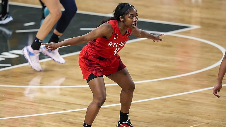 May 27, 2021; College Park, Georgia, USA; Atlanta Dream guard Aari McDonald (4) defends against the Dallas Wings during the second half at Gateway Center Arena at College Park. Mandatory Credit: Dale Zanine-USA TODAY Sports