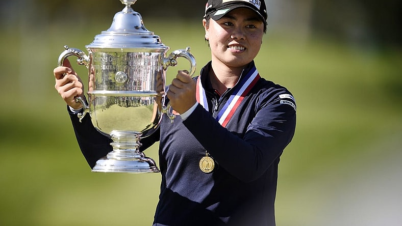 Jun 6, 2021; San Francisco, California, USA; Yuka Saso hoists the US Open trophy after winning in a sudden death playoff over Nasa Hataoka following the final round of the U.S. Women's Open golf tournament at The Olympic Club. Mandatory Credit: Kelvin Kuo-USA TODAY Sports