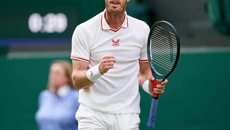 Jun 28, 2021; London, United Kingdom; Andy Murray (GBR) reacts against Nikoloz Basilashvili (GE) on the Centre Court in the first round at All England Lawn Tennis and Croquet Club. Mandatory Credit: Peter van den Berg-USA TODAY Sports