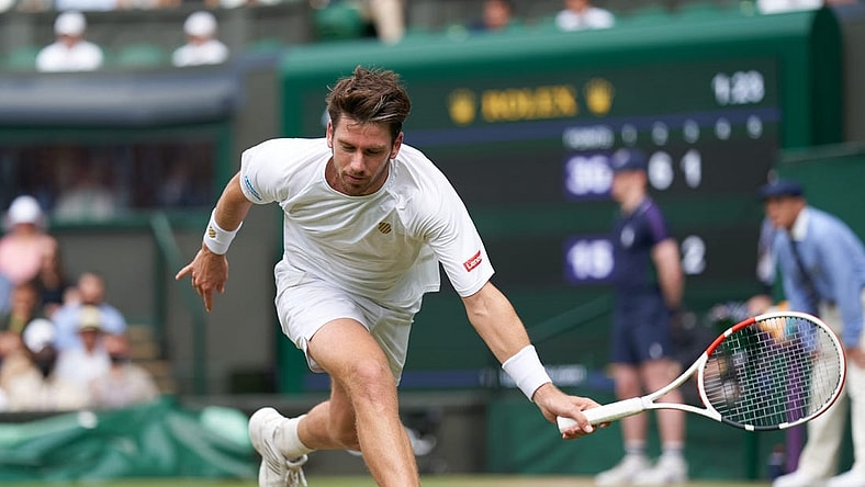 Jul 3, 2021; London, United Kingdom;  Cameron Norrie (GBR) plays Roger Federer (SUI)  on Centre Court in the men   s third round at All England Lawn Tennis and Croquet Club. Mandatory Credit: Peter van den Berg-USA TODAY Sports