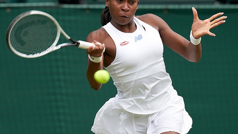 Jul 5, 2021; London, United Kingdom;  Coco Gauff (USA) seen playing Angelique Kerber (GER) on the Centre court in the ladies fourth round at All England Lawn Tennis and Croquet Club. Mandatory Credit: Peter van den Berg-USA TODAY Sports