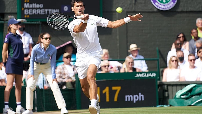 Jul 11, 2021; London, United Kingdom; Novak Djokovic (SRB) plays against Matteo Berrettini (ITA) in the men s final on Centre Court at All England Lawn Tennis and Croquet Club. Mandatory Credit: Peter van den Berg-USA TODAY Sports