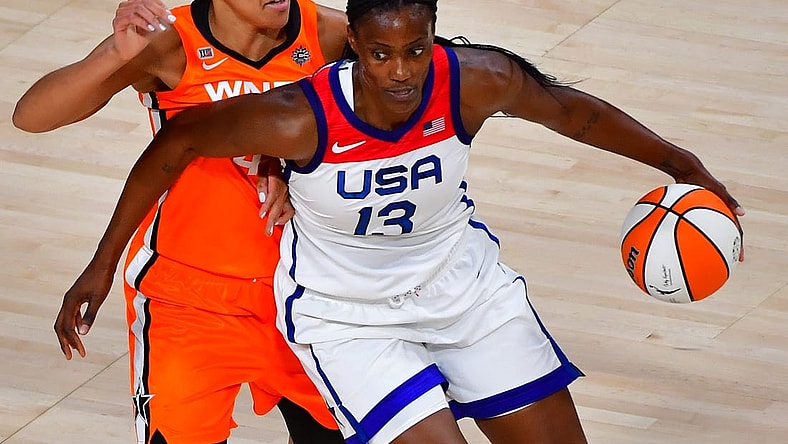 Jul 14, 2021; Las Vegas, NV, USA; Team USA center Sylvia Fowles (13) dribbles around WNBA All Star forward Brionna Jones (42) during the WNBA All Star Game at Michelob Ultra Arena at Mandalay Bay Resort. Mandatory Credit: Stephen R. Sylvanie-USA TODAY Sports