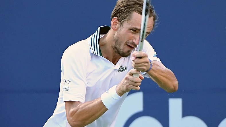 Aug 12, 2021; Toronto, Ontario, Canada;  Daniil Medvedev of Russia plays a shot against James Duckworth of Australia during fourth round play in the National Bank Open at Aviva Centre. Mandatory Credit: Dan Hamilton-USA TODAY Sports