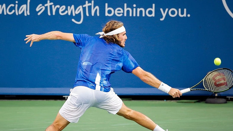 Stefanos Tsitsipas returns a shot during a match between Lorenzo Sonego (ITA) and Stefanos Tsitsipas (GRE) in the Western & Southern Open at the Lindner Family Tennis Center in Mason, Ohio on Thursday, Aug. 19, 2021. Tsitsipas won 5-7, 6-3, 6-4.