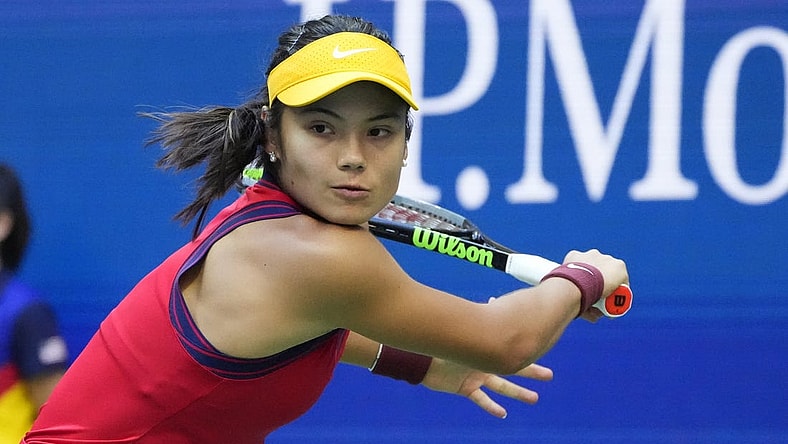 Sep 11, 2021; Flushing, NY, USA; Emma Raducanu of Great Britain hits a backhand against Leylah Fernandez of Canada (not pictured) in the women's singles final on day thirteen of the 2021 U.S. Open tennis tournament at USTA Billie Jean King National Tennis Center. Mandatory Credit: Robert Deutsch-USA TODAY Sports