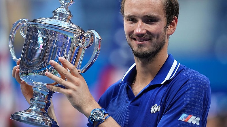 Sep 12, 2021; Flushing, NY, USA; Daniil Medvedev of Russia celebrates with the championship trophy after his match against Novak Djokovic of Serbia (not pictured) in the men's singles final on day fourteen of the 2021 U.S. Open tennis tournament at USTA Billie Jean King National Tennis Center. Mandatory Credit: Danielle Parhizkaran-USA TODAY Sports