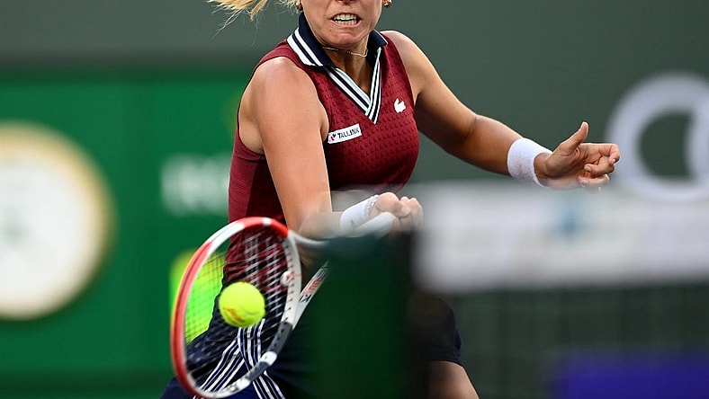 Oct 14, 2021; Indian Wells, CA, USA; Anett Kontaveit (EST) hits a shot against Ons Jabeur (TUN) in their quarterfinal match during the BNP Paribas Open at the Indian Wells Tennis Garden. Mandatory Credit: Jayne Kamin-Oncea-USA TODAY Sports