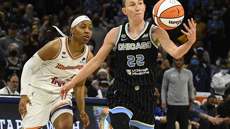 Oct 17, 2021; Chicago, Illinois, USA; Chicago Sky guard Courtney Vandersloot (22) and Phoenix Mercury guard Shey Peddy (5) during the second half of game four of the 2021 WNBA Finals at Wintrust Arena. Mandatory Credit: Matt Marton-USA TODAY Sports