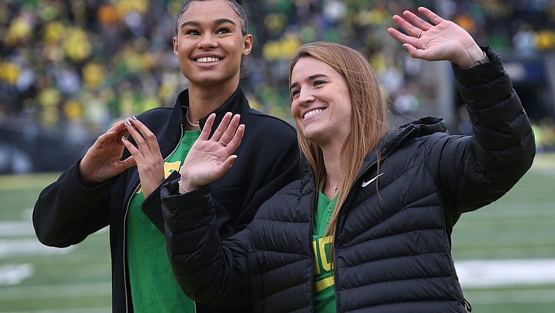 Former Oregon women basketball players Satou Sabally, left, and Sabrina Ionescu are introduced during the Oregon Colorado Saturday Oct. 30, 2021.

Eug 103021 Uo Cofb10