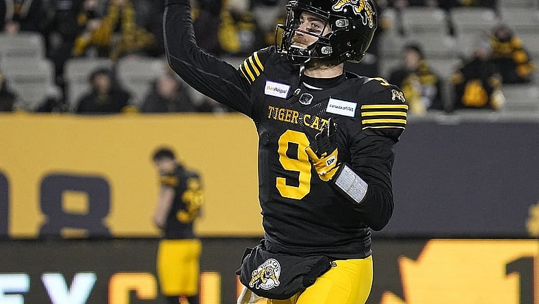 Dec 12, 2021; Hamilton, Ontario, CAN; Hamilton Tiger-Cats quarterback Dane Evans (9) throws a pass during warmup for the 108th Grey Cup football game against Winnipeg Blue Bombers at Tim Hortons Field. Mandatory Credit: John E. Sokolowski-USA TODAY Sports