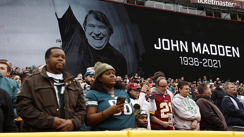 Jan 2, 2022; Landover, Maryland, USA; Fans observe a moment of silence for the late John Madden prior to the game between the Washington Football Team and the Philadelphia Eagles at FedExField. Mandatory Credit: Geoff Burke-USA TODAY Sports