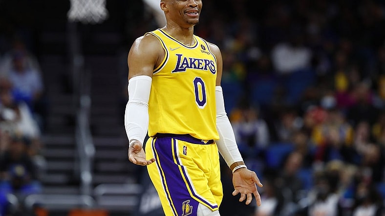 Jan 21, 2022; Orlando, Florida, USA; Los Angeles Lakers guard Russell Westbrook (0) smiles against the Orlando Magic during the second quarter at Amway Center. Mandatory Credit: Kim Klement-USA TODAY Sports