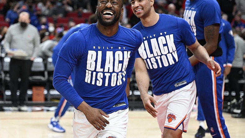 Feb 12, 2022; Portland, Oregon, USA; New York Knicks guard Kemba Walker (8) laughs as he is introduced before a game against the Portland Trail Blazers at Moda Center. The Trail Blazers won the game 112-103. Mandatory Credit: Troy Wayrynen-USA TODAY Sports