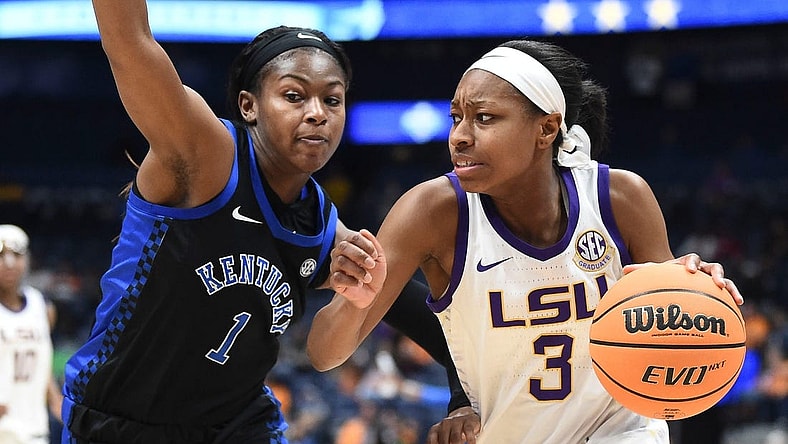LSU guard Khayla Pointer (3) tries to get to the basket while guarded by Kentucky guard Robyn Benton (1) during the SEC Women's Basketball Tournament game in Nashville, Tenn. on Friday, March 4, 2022.

Sec Tourney Lsu Ky