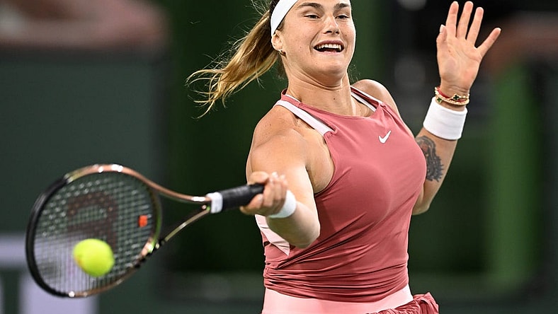 Mar 8, 2022; Indian Wells, CA, USA;  Aryna Sabalenka participates in the Eisenhower Cup, a charity event using the the Tie Break Tens format  at the BNP Paribas Open at Indian Wells Tennis Garden. Mandatory Credit: Jayne Kamin-Oncea-USA TODAY Sports
