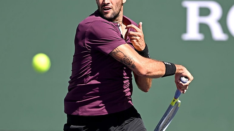 Mar 16, 2022; Indian Wells, CA, USA; Matteo Berrettini (ITA) hits a shot during his fourth round match against Miomir Kecmanovic (not pictured) at the BNP Paribas Open at the Indian Wells Tennis Garden. Mandatory Credit: Jayne Kamin-Oncea-USA TODAY Sports