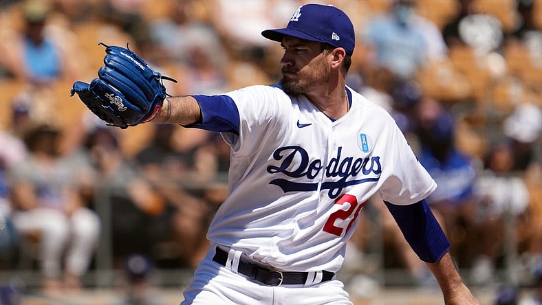 Mar 27, 2022; Phoenix, Arizona, USA; Los Angeles Dodgers starting pitcher Andrew Heaney (28) pitches against the Chicago White Sox during the first inning of a spring training game at Camelback Ranch-Glendale. Mandatory Credit: Joe Camporeale-USA TODAY Sports