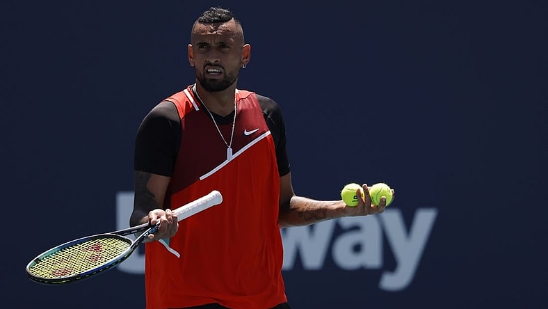 Mar 29, 2022; Miami Gardens, FL, USA; Nick Kyrgios (AUS) talks to the crowd between points against Jannik Sinner (ITA)(not pictured) in a fourth round men's singles match in the Miami Open at Hard Rock Stadium. Mandatory Credit: Geoff Burke-USA TODAY Sports