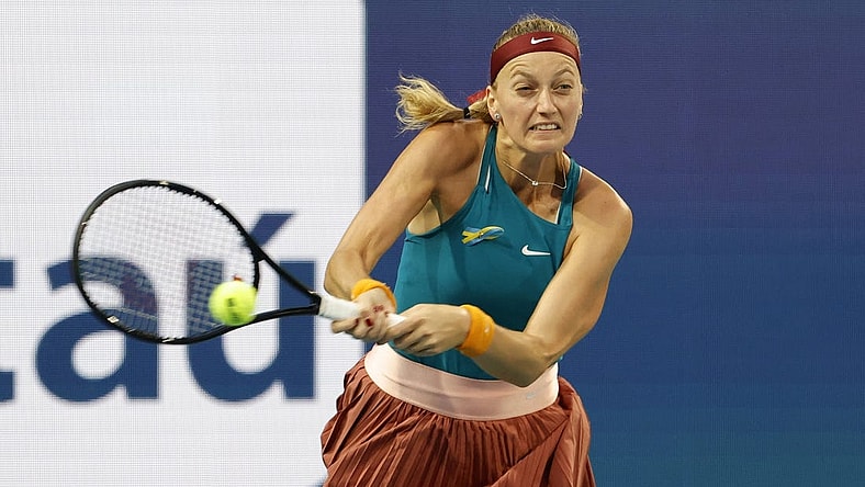 Mar 30, 2022; Miami Gardens, FL, USA; Petra Kvitova (CZE) hits a backhand against Iga Swiatek (POL)(not pictured) in a women's singles quarterfinal match in the Miami Open at Hard Rock Stadium. Mandatory Credit: Geoff Burke-USA TODAY Sports