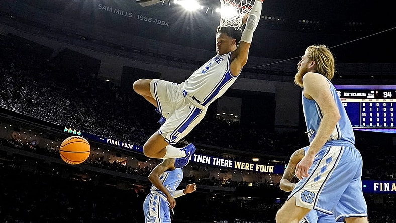 Apr 2, 2022; New Orleans, LA, USA; Duke Blue Devils forward Paolo Banchero (5) dunks the ball against North Carolina Tar Heels forward Brady Manek (45) during the second half in the 2022 NCAA men's basketball tournament Final Four semifinals at Caesars Superdome. Mandatory Credit: Robert Deutsch-USA TODAY Sports