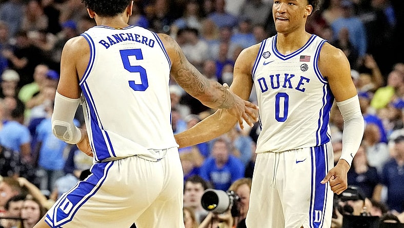 Apr 2, 2022; New Orleans, LA, USA; Duke Blue Devils forward Paolo Banchero (5) and forward Wendell Moore Jr. (0) celebrates after a play during the second half against the North Carolina Tar Heels in the 2022 NCAA men's basketball tournament Final Four semifinals at Caesars Superdome. Mandatory Credit: Robert Deutsch-USA TODAY Sports