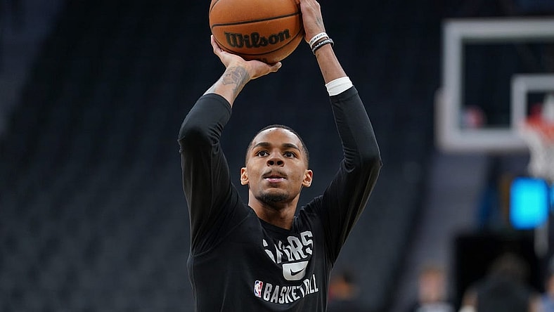 Apr 3, 2022; San Antonio, Texas, USA; San Antonio Spurs guard Dejounte Murray (5) warms up before the game against the Portland Trail Blazers at the AT&T Center. Mandatory Credit: Daniel Dunn-USA TODAY Sports