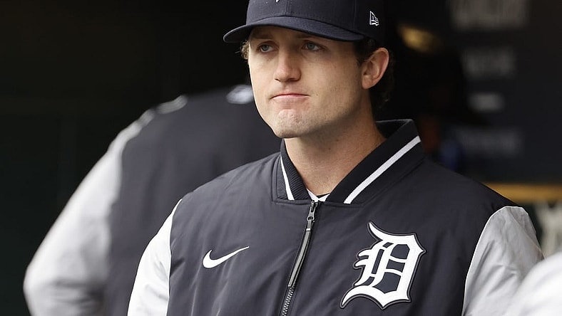 Apr 9, 2022; Detroit, Michigan, USA;  Detroit Tigers starting pitcher Casey Mize (12) watches from the dugout in the fifth inning against the Chicago White Sox at Comerica Park. Mandatory Credit: Rick Osentoski-USA TODAY Sports
