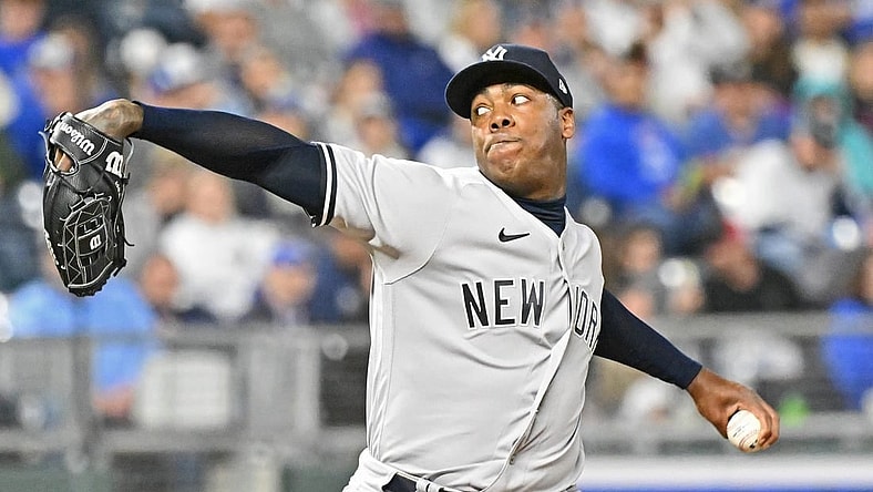 Apr 30, 2022; Kansas City, Missouri, USA;  New York Yankees relief pitcher Aroldis Chapman (54) delivers a pitch during the ninth inning against the Kansas City Royals at Kauffman Stadium. Mandatory Credit: Peter Aiken-USA TODAY Sports