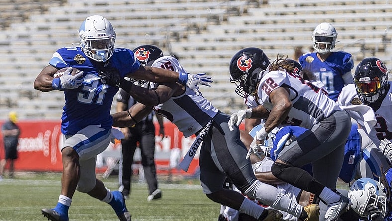 May 8, 2022; Birmingham, AL, USA; New Orleans Breakers running back Jordan Ellis (31) runs for a touchdown against the Houston Gamblers during the first half at Protective Stadium. Mandatory Credit: Vasha Hunt-USA TODAY Sports