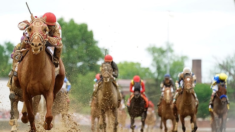 Rich Strike, left, with jockey Sonny Leon aboard, wins the Kentucky Derby.

 Syndication The Courier Journal