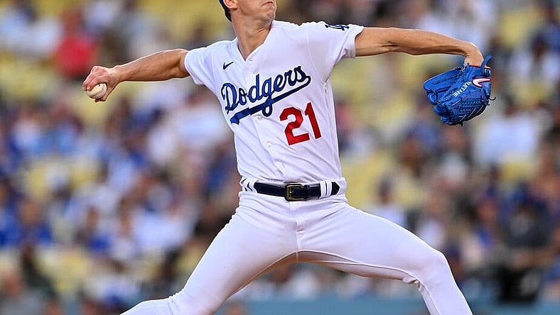 May 13, 2022; Los Angeles, California, USA;  Los Angeles Dodgers starting pitcher Walker Buehler (21) pitches in the second inning against the Philadelphia Phillies at Dodger Stadium. Mandatory Credit: Jayne Kamin-Oncea-USA TODAY Sports