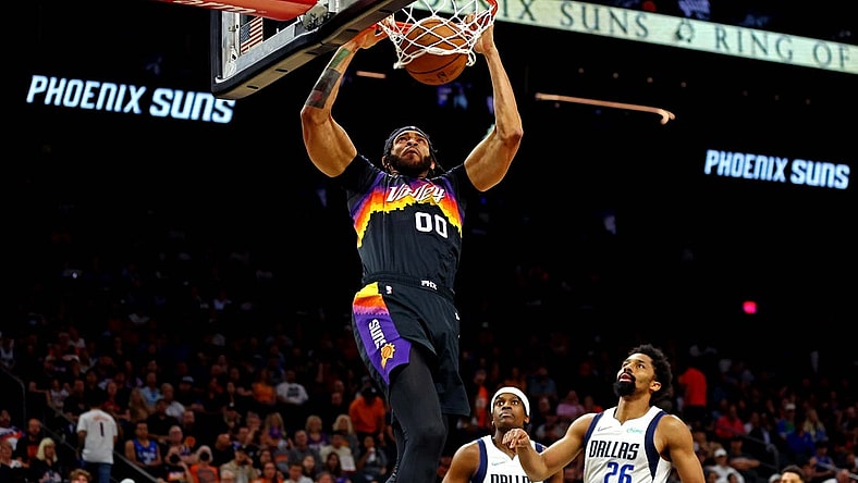 May 15, 2022; Phoenix, Arizona, USA; Phoenix Suns center JaVale McGee (00) dunks the ball against Dallas Mavericks guard Spencer Dinwiddie (26) during the fourth quarter in game seven of the second round for the 2022 NBA playoffs at Footprint Center. Mandatory Credit: Mark J. Rebilas-USA TODAY Sports