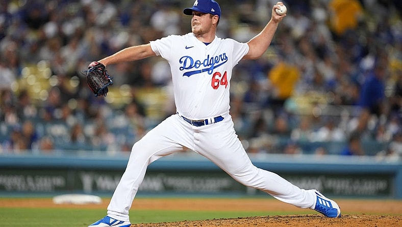 May 16, 2022; Los Angeles, California, USA; Los Angeles Dodgers relief pitcher Caleb Ferguson (64) delivers a pitch in the seventh inning against the Arizona Diamondbacks at Dodger Stadium. Mandatory Credit: Kirby Lee-USA TODAY Sports