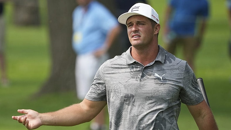May 17, 2022; Tulsa, Oklahoma, USA; Bryson DeChambeau reacts to his hits from the fairway on the 9th hole during a practice round for the PGA Championship golf tournament at Southern Hills Country Club. Mandatory Credit: Michael Madrid-USA TODAY Sports