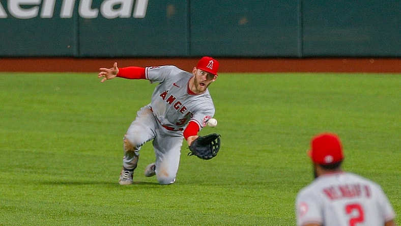 May 18, 2022; Arlington, Texas, USA; Los Angeles Angels right fielder Taylor Ward (3) makes a diving catch during the eighth inning against the Texas Rangers at Globe Life Field. Mandatory Credit: Andrew Dieb-USA TODAY Sports
