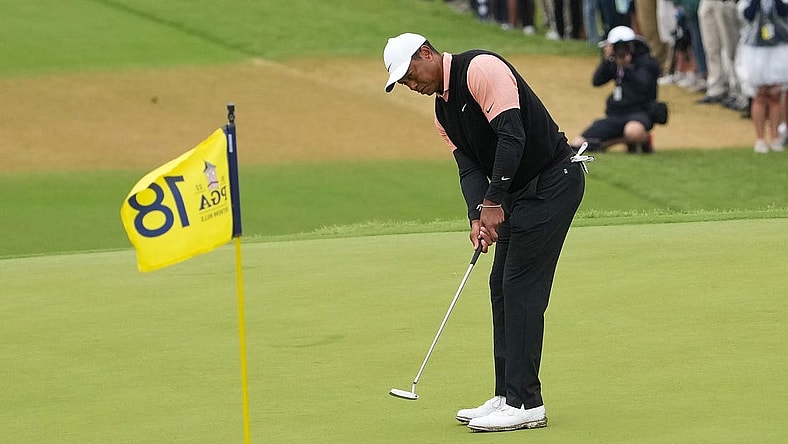 May 21, 2022; Tulsa, OK, USA; Tiger Woods puts on the 18th green during the third round of the PGA Championship golf tournament at Southern Hills Country Club. Mandatory Credit: Michael Madrid-USA TODAY Sports