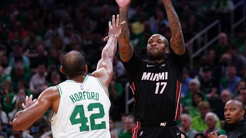 May 21, 2022; Boston, Massachusetts, USA; Miami Heat forward P.J. Tucker (17) shoots the ball against Boston Celtics center Al Horford (42) in the second quarter during game three of the 2022 eastern conference finals at TD Garden. Mandatory Credit: David Butler II-USA TODAY Sports