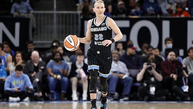 May 24, 2022; Chicago, Illinois, USA; Chicago Sky guard Courtney Vandersloot (22) brings the ball up court against the Indiana Fever during the first half at Wintrust Arena. Mandatory Credit: Kamil Krzaczynski-USA TODAY Sports