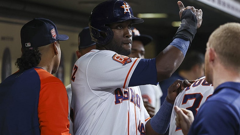 May 24, 2022; Houston, Texas, USA; Houston Astros left fielder Yordan Alvarez (44) celebrates in the dugout after scoring during the fifth inning against the Cleveland Guardians at Minute Maid Park. Mandatory Credit: Troy Taormina-USA TODAY Sports