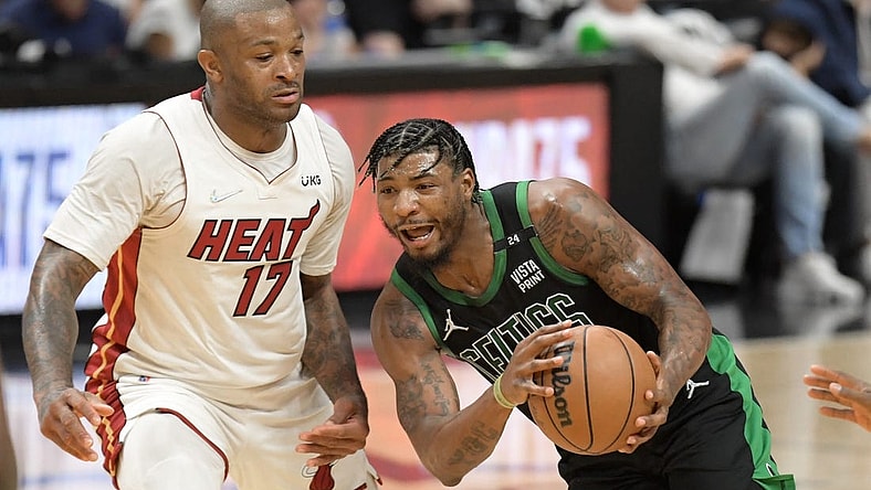 May 25, 2022; Miami, Florida, USA; Boston Celtics guard Marcus Smart (36) drives to the basket against Miami Heat forward P.J. Tucker (17) during the second half of game five of the 2022 eastern conference finals at FTX Arena. Mandatory Credit: Jim Rassol-USA TODAY Sports