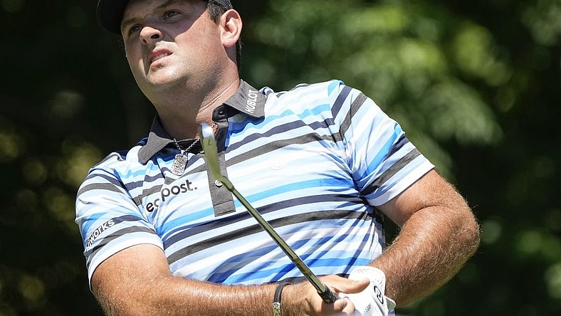 May 27, 2022; Fort Worth, Texas, USA; Patrick Reed plays his shot from the eighth tee during the second round of the Charles Schwab Challenge golf tournament. Mandatory Credit: Jim Cowsert-USA TODAY Sports